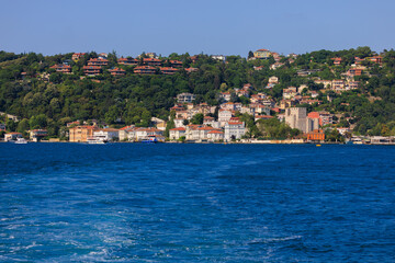 Blue seascape overlooking the coast. View of the Bosphorus in Istanbul city on sunny summer day, in a public place.