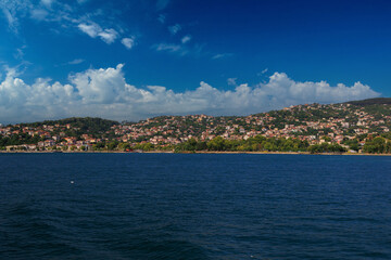 Fototapeta premium Citycape, View of the Bosphorus in Istanbul city on sunny summer day, in a public place.