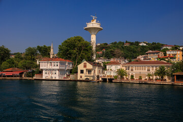 Blue seascape overlooking the coast. View of the Bosphorus in Istanbul city on sunny summer day, in a public place.