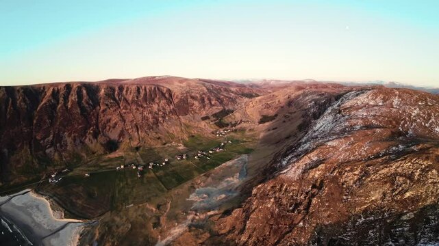 Majestic valley, sandy beach and mountains in Norway, aerial view