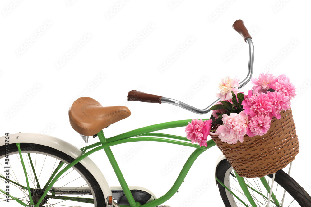 Poster Bicycle with basket of pink peony flowers isolated on white