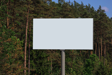 White billboard along the highway. Background for design and advertising. 