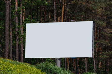 White billboard along the highway. Background for design and advertising. 