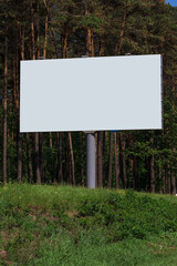 White billboard along the highway. Background for design and advertising. 