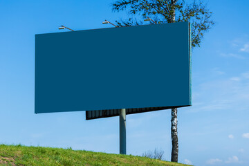 White billboard along the highway. Background for design and advertising. 