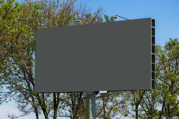 White billboard along the highway. Background for design and advertising. 