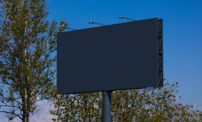 White billboard along the highway. Background for design and advertising. 