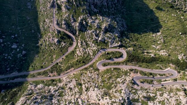 4K Aerial Drone video of mesmerizing serpentine roads in the mountains of Coll dels Reis, Nus de Sa Corbata, Mallorca