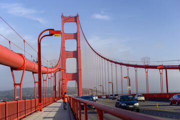 Tourists and cars on Golden Gate Bridge. San Francisco. California.