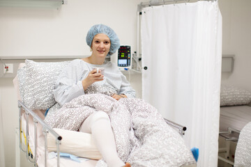 Young woman in hospital recovery room after surgery