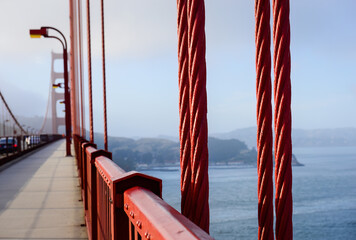 Obraz premium Vertical suspender ropes of the Golden Gate Bridge. San Francisco. California.