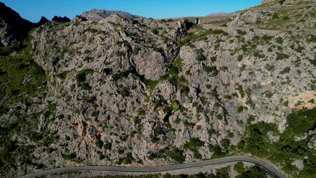 4K Aerial Drone video of mesmerizing serpentine roads in the mountains of Coll dels Reis, Nus de Sa Corbata, Mallorca