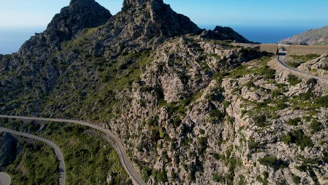 4K Aerial Drone video of mesmerizing serpentine roads in the mountains of Coll dels Reis, Nus de Sa Corbata, Mallorca