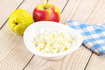 Organic cottage cheese in the bowl