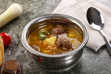 Soup with beef meatball and vegetables