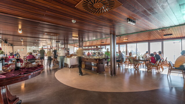 Panorama showing morning catering buffet food indoor in luxury restaurant with meat, colorful fruits and vegetables timelapse.