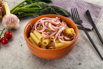 Italian cuisine - pasta tortiglioni with squid