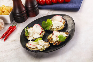 Grilled eggplant with cheese and radish