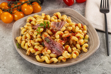 Italian pasta cellentani with anchovy