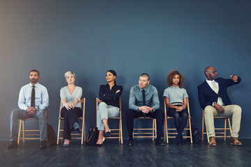Business people, hiring and waiting in row for interview with recruitment process or employment...
