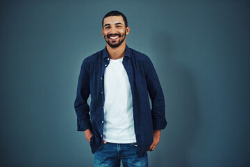 Creative, designer or portrait of happy man in studio with pride, business and confidence for...