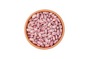 Young, raw Cranberry or pinto beans in a ceramic bowl. isolated on white background. flat lay