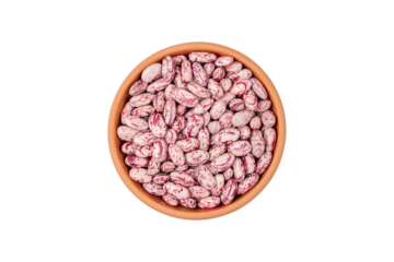 Young, raw Cranberry or pinto beans in a ceramic bowl. isolated on white background. flat lay
