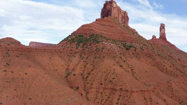 Large Natural rock formation, Parriot Mesa, in Utah desert, Moab. Aerial low angle pull out shot