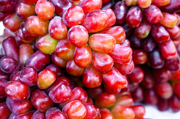close up fresh red grapes background