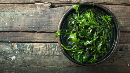 Fresh Seaweed Salad on Rustic Wooden Table, Natural Green Sea Vegetables Plate, Organic Edible Marine Plants Dish