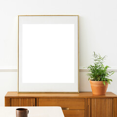 Picture frame mockup on a wooden cabinet