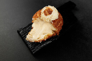 Classic Shu cake (choux). Custard dough based on butter and milk, classic custard filling with...