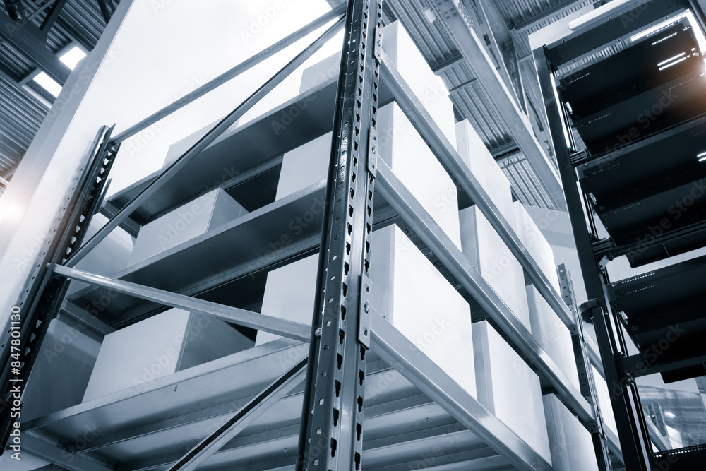 Poster a warehouse with a lot of white boxes stacked on shelves. the boxes are organized in a way that make