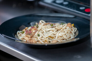 Mcoronas in a frying pan are prepared for Japanese cuisine.