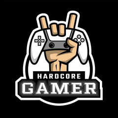 The hand holds the controller. Hardcore gamer logo.