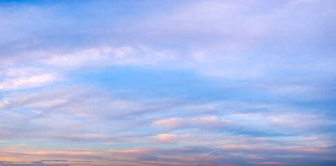 Beautiful sky sunset with red clouds on blue background