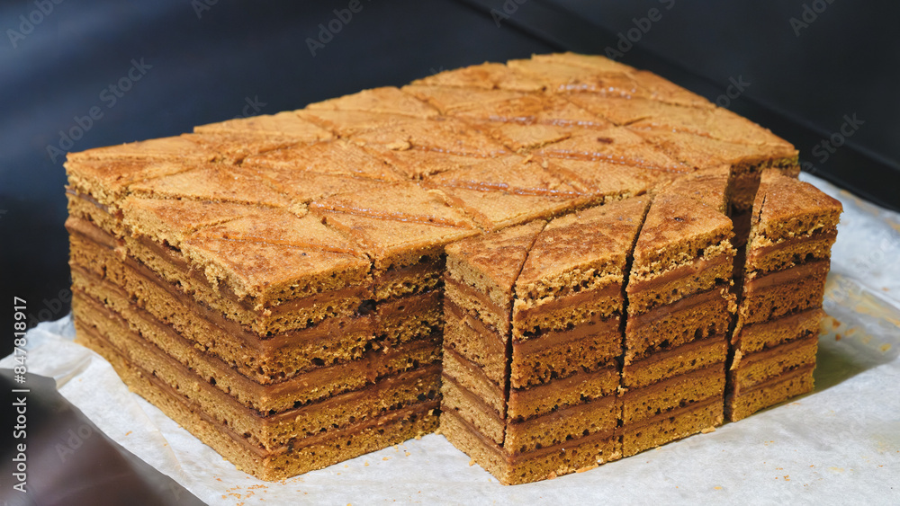 Aufkleber a stack of brownies with a few slices missing. concept of indulgence and temptation, as the brownies