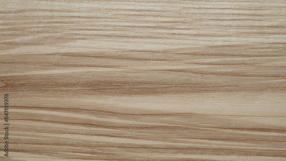 Poster a wooden surface with a grainy texture background. the wood appears to be aged and has a natural, ru