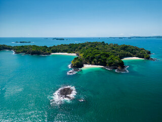 Aerial top view of Bolaños tropical island beach with white sand and emerald water, Chiriquí gulf, Chiriquí province, Panamá, Central America - stock photo
