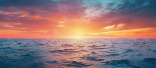 Obraz premium Sunset in the middle of the sea. Creative banner. Copyspace image