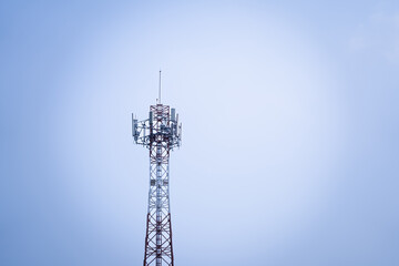 Telecommunications tower, transmitter, wireless communication antenna 5G cellular network, global connectivity In the background, the sky is bright