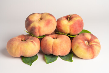 Paraguayan fruit, ripe isolated on a white background. also called flat peach