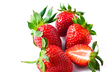 Strawberries isolated. Ripe sweet strawberries and half a berry on a white background. 1