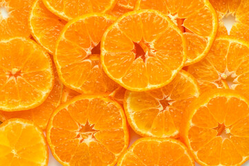 Texture of sweet peeled mandarins as background