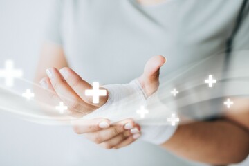 Woman with gauze bandage wrapped around her hand remix