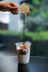 glass of coffee with milk on the table