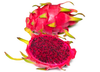 Delicious cut and whole dragon fruits (pitahaya) on white background