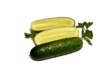Green cucumbers, one cut, the other whole.