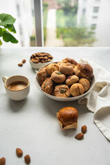 Variety of homemade Italian sweets typical for Sardinia region. Pardulas, amaretti, papassine and...