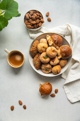Variety of homemade Italian sweets typical for Sardinia region. Pardulas, amaretti, papassine and...